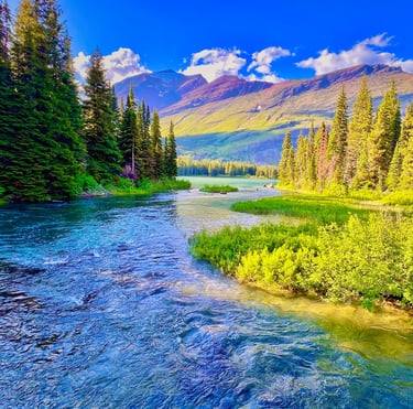 A scenic mountain landscape featuring a flowing river, pine trees, and peaks in Glacier National Park.