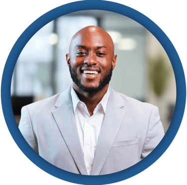 a man in a suit and tie smiling