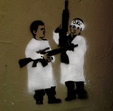 Boys being taught to wage war