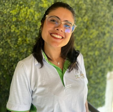 a woman in a white shirt and glasses
