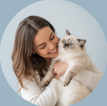 A happy woman warmly hugging a white fluffy cat.