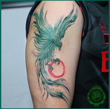 Unique turquoise phoenix tattoo design by MaxDuong Tattoo