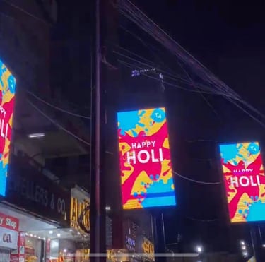 a group of banners hanging from a pole