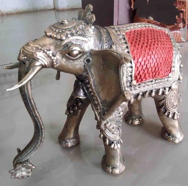 Side view of handcrafted brass elephant with red-painted back-Perfect for international delivery"