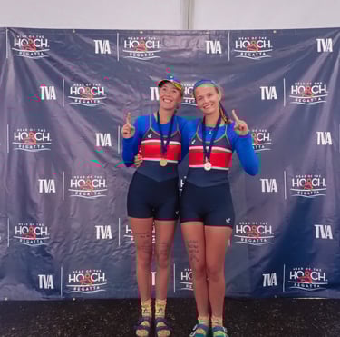 Anna and Maija with GOLD medals on the 2025 Hooch podium
