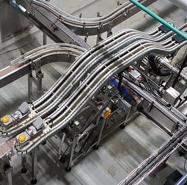 Transportadores de piso, aéreos, elevadores, volteadores, etc.