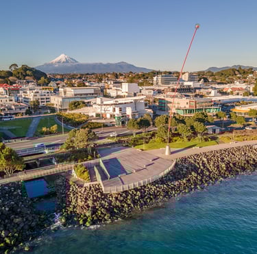 New Plymouth city skyline looking south from the foreshore with Mount Taranaki on the horizon.