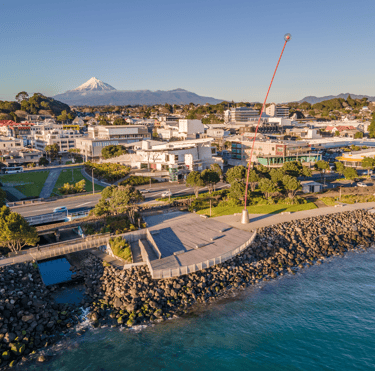 New Plymouth city skyline looking south from the foreshore with Mount Taranaki on the horizon.