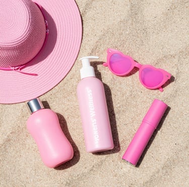 A serene workspace with soft ivory and dusty mauve accents, featuring a laptop displaying an e-learning course.