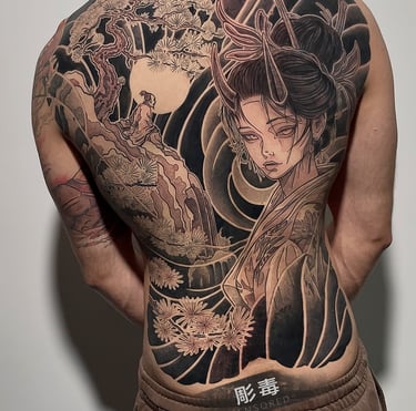 tatuaggio giapponese sulla schiena con una donna ispirata a Hannya eseguito da Horidoku 