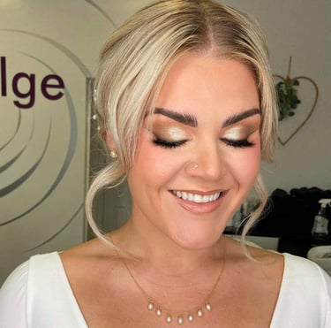 a women having her bridal makeup done
