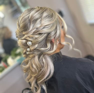 a women having her bridal hair done