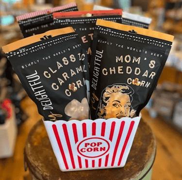 a popcorn box with popcorn and popcorn