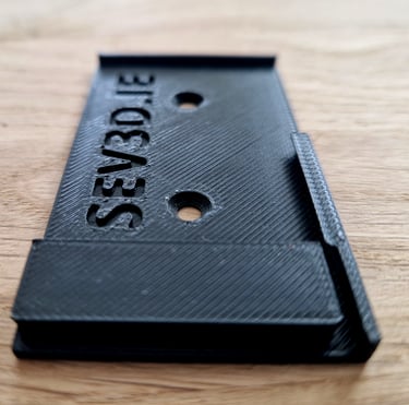 EZ Label Slide photo. Black plastic electronic label holder with SEV3D.IE description