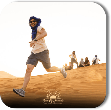 people enjoying in the moroccan desert with soul of nomads - dar toda - about us