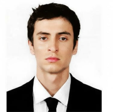 a man in a suit and tie with a black tie