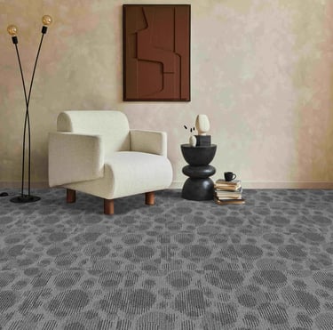 Living room with grey carpet tiles in an organic bubble pattern - ideal for offices