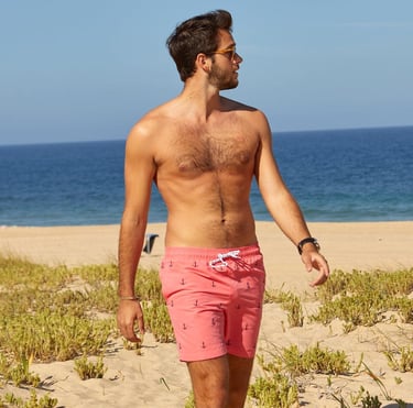 Quick-dry men’s 7-inch swim shorts with mesh lining, perfect for beach and pool.
