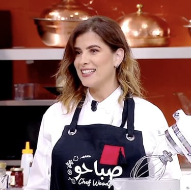 Well-known chef in a unique apron designed just for her