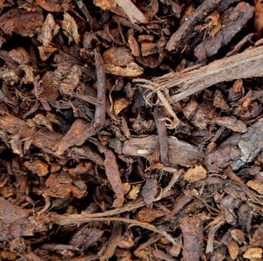 a bunch of mulch used and spread in a garden