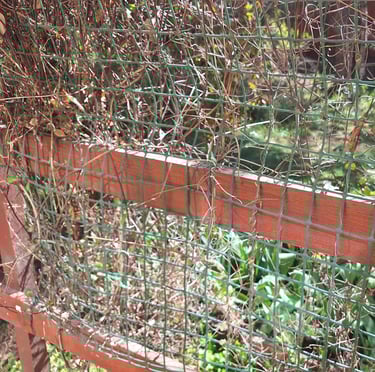 a fence that holds compost