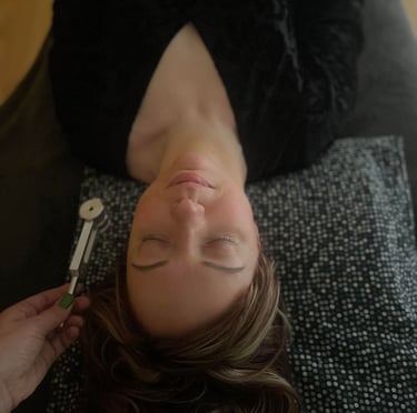 a woman during a sound therapy session
