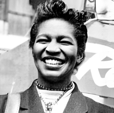 Smiling Claudia Jones representing the They Did I Can Too Creatives pioneers and icons section.