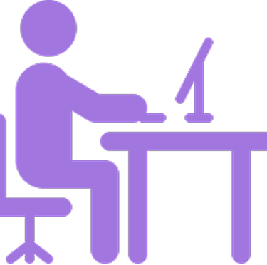 a person sitting at a desk with a computer