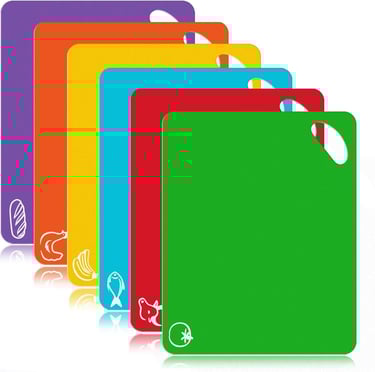 a set of four colorful cutting board chopping boards