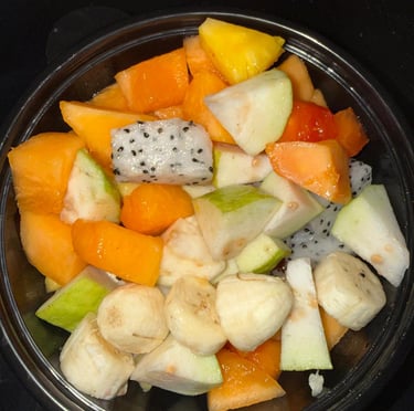 Fruit bowl with ice cream