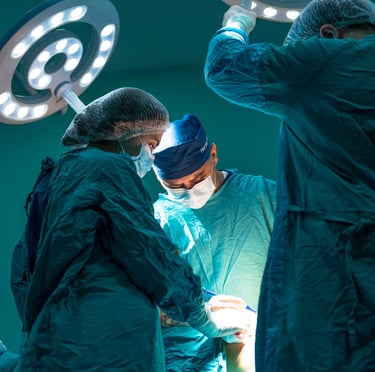 a group of surgeons in a hospital room