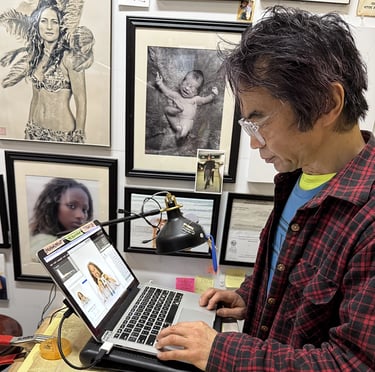 Photographer Kenji Fukudome working on images from photo shoot with Tal Avitzur.