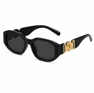 Black luxury sunglasses with gold accents isolated on a clean white background.