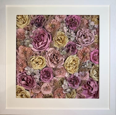 a flower wall style preserved wedding bouquet of soft pinks