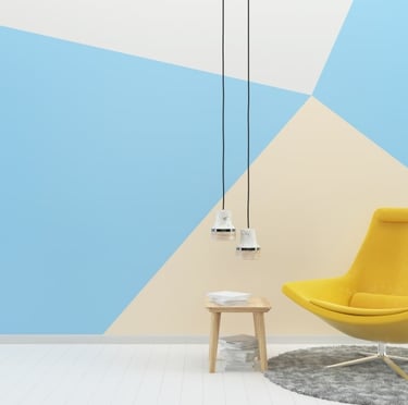 Mur bleu et blanc peints avec des motifs géométriques