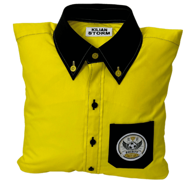 a yellow shirted pillow with a black collar and pocket