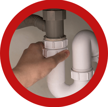 a person holding a pipe in a pipe