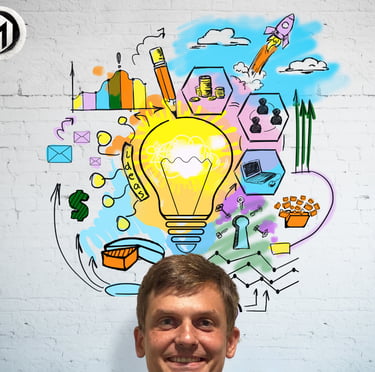 a man standing in front of a wall with a light bulb