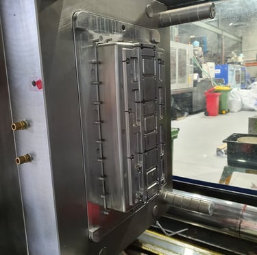 Injection mould for Plasdev housing in moulding machine