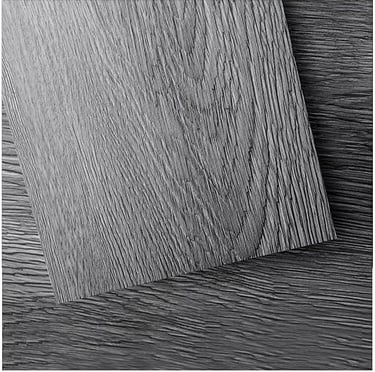 Modern kitchen flooring in deep gray vinyl planks — peel-and-stick, wood-look, durable surface.