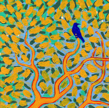 a bird sitting on a tree branch in a tree