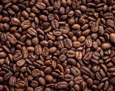 a pile of coffee beans and coffee beans hamer candy