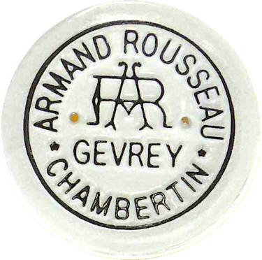 Bottle capsule of the Domaine Armand Rousseau Chambertin accounts seen from above