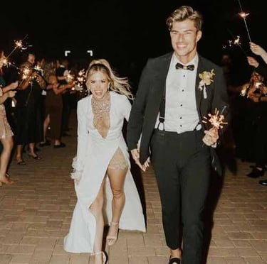 Couple laughing and enjoying wedding