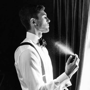 Groom adjusting his tie before the ceremony