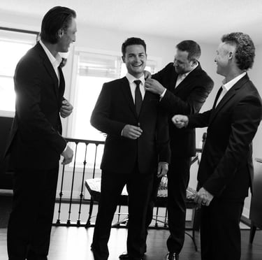 Groom getting ready with friends