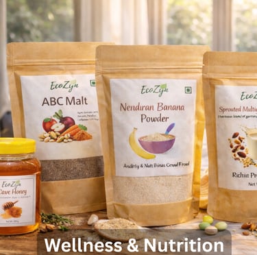 EcoZyn wellness products including ABC Malt, Nendran Banana Powder, and organic Cave Honey on a wooden table.