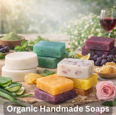 A collection of colorful organic handmade soap bars with natural ingredients like aloe vera and honeycomb.