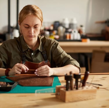 a woman in a green shirt and a brown wallet