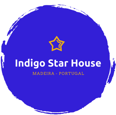 a blue and white logo with the words indigo star house